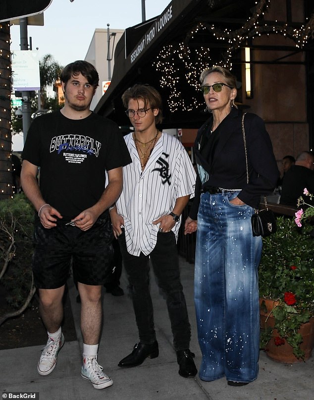 She seemed excited to spend quality time with her children as they stopped to pose for photos in valet parking.