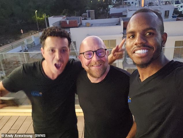 The raver explained that he had some time before his flight, so he decided to head to the huge Eden club. Pictured here he is with the bar staff in Ibiza