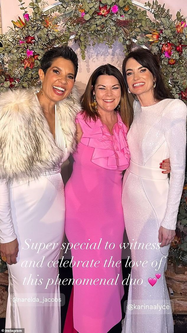 Karina's dress had an open back and was floor-length, with a slight sheen to the fabric. Pictured here with Senator Sarah Hanson-Young (centre)