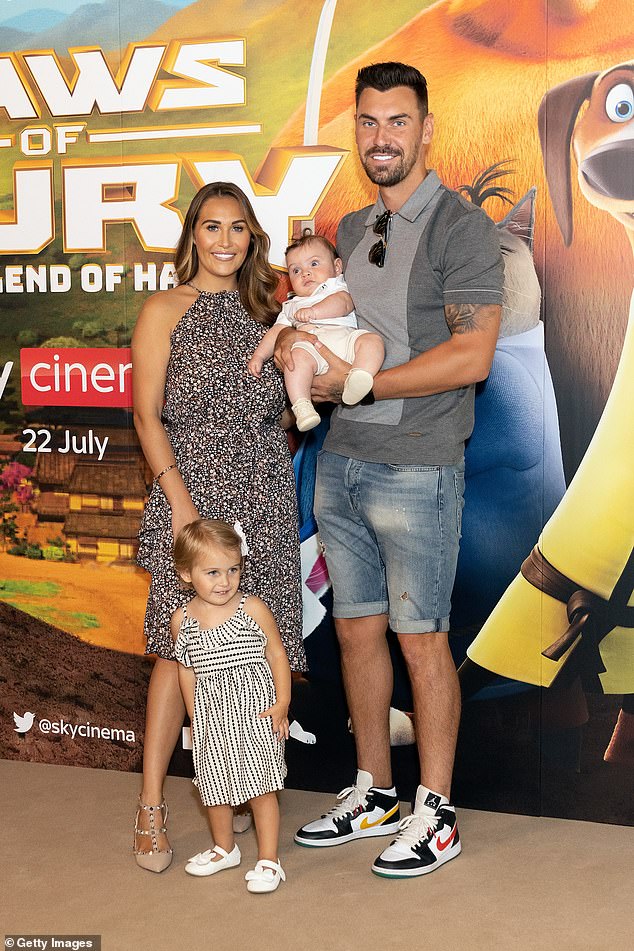 Chloe banned Lauryn from attending her wedding to Grant Hall (Chloe pictured with husband Grant and children Isla, four, and Hudson, two, in 2022)