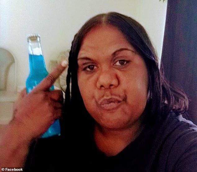 The mother-of-five (pictured) smashed a bottle against rocks before stabbing her relative, who suffered a deep wound to the left side of his jaw.