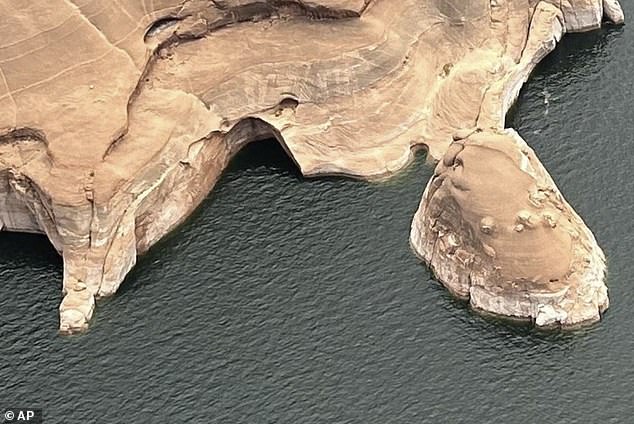 Rangers suspect that changing water levels and wave erosion at Lake Powell contributed to the collapse (photo after collapse)