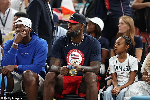 LeBron James looked on with his own gold medal after the men's victory on Saturday.