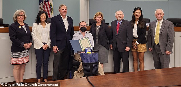 In a third position that DC government was aware of, Lian (second from left) was elected to serve a four-year term on the Falls Church City Council from 2022 to 2025, a position paying $9,200 a year.