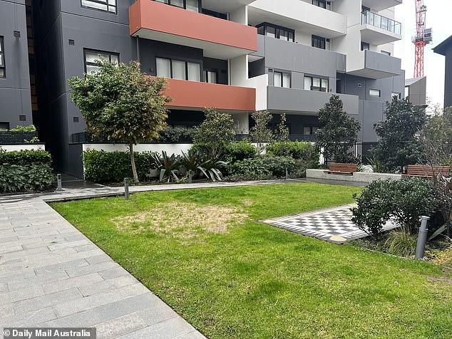 The man's body was found in the courtyard of a building on Conder Street in Burwood, in Sydney's inner west.