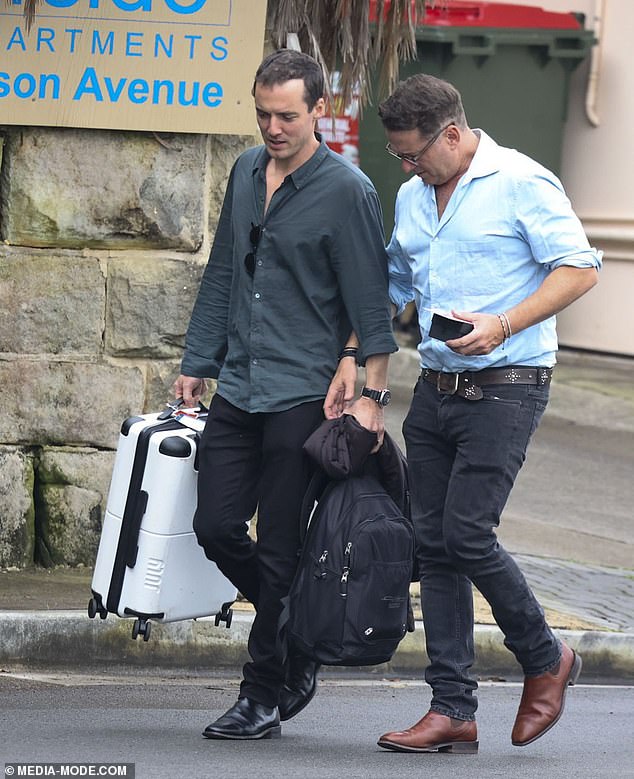 Tom appeared to have flown in for the event as he still had luggage with him.