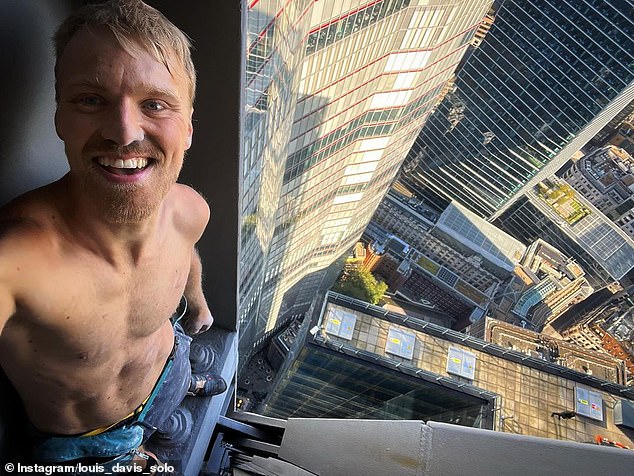 Davis is seen standing atop London's famous Cheesegrater building after a daring climb in September 2023.