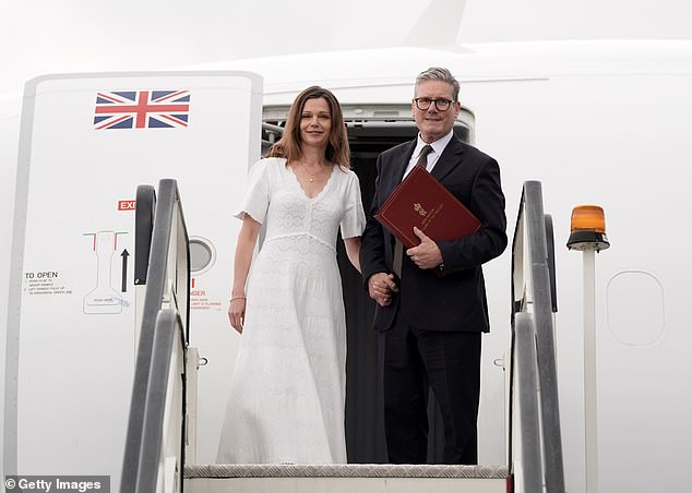 She chose a £450 Needle and Thread dress for the eight-hour flight.