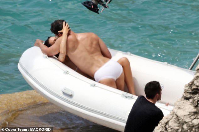 Last month, Theo was filming an advert for Dolce and Gabbana which saw him strip down to a pair of tiny white briefs and share a passionate kiss with bikini model Vittoria Ceretti.