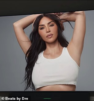 Kim sported a white cropped top as she posed sideways for the ad.