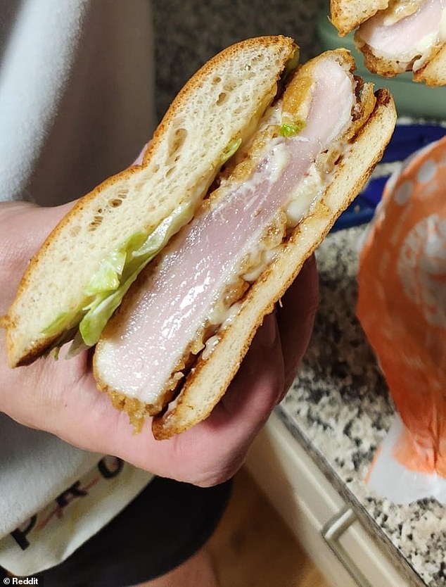 The man said he has since reported the raw burger to Queensland Health and Hungry Jacks (pictured is the raw chicken burger)