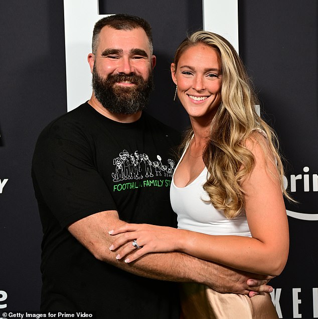 Kelce, pictured with wife Kylie, says his weight loss means he won't be able to return to the NFL