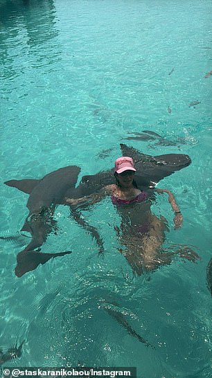 She also shared images of herself wearing the same bikini, but this time with a light pink trucker cap on her head.