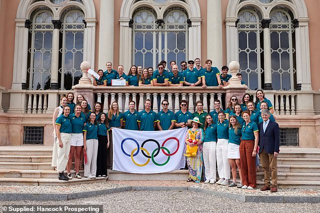 Ms Rinehart (centre right) poses with members of the Australian rowing team for the Paris Olympics.