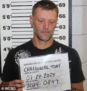 Tony Charboneau appears in a police photo