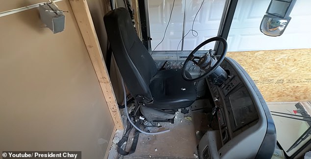 He closed off the driver's compartment and turned it into his own room.