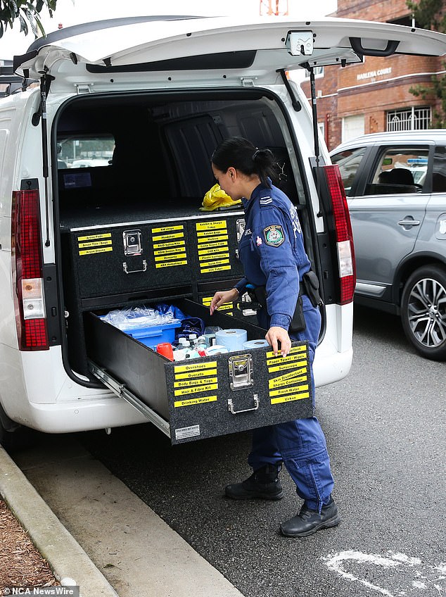 A New South Wales Police spokesperson told the Daily Mail that Australian officers will investigate whether there was a history of domestic violence between the couple (pictured, forensic officers at the scene).