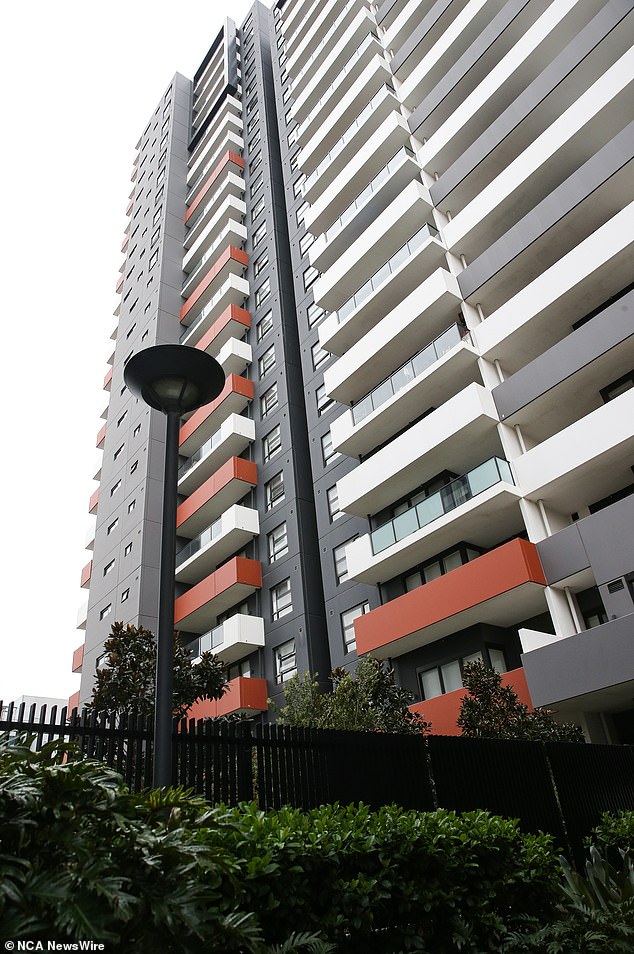 The woman's partner, also 21, jumped to his death from a balcony at the apartment complex (pictured) and police discovered his body in the building's courtyard.