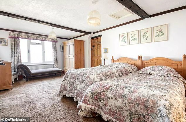 The largest bedroom, spanning the full depth of the property, has views in both directions.