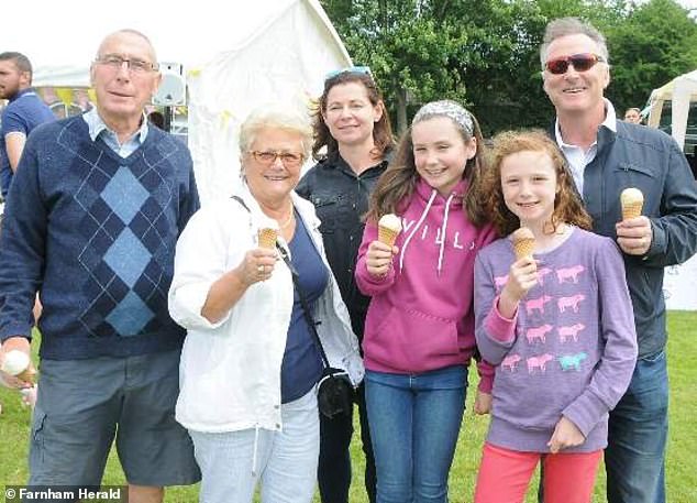 Thorpe with his wife Amanda, their two daughters Kitty, now 22, and Emma, ​​now 19, and his parents at the Wrecclesham village fair in Surrey in 2016