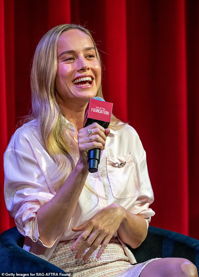 The 34-year-old actress, who plays Elizabeth Zott, looked dapper in her suit as she discussed her Apple TV series Lessons In Chemistry with co-star Aja