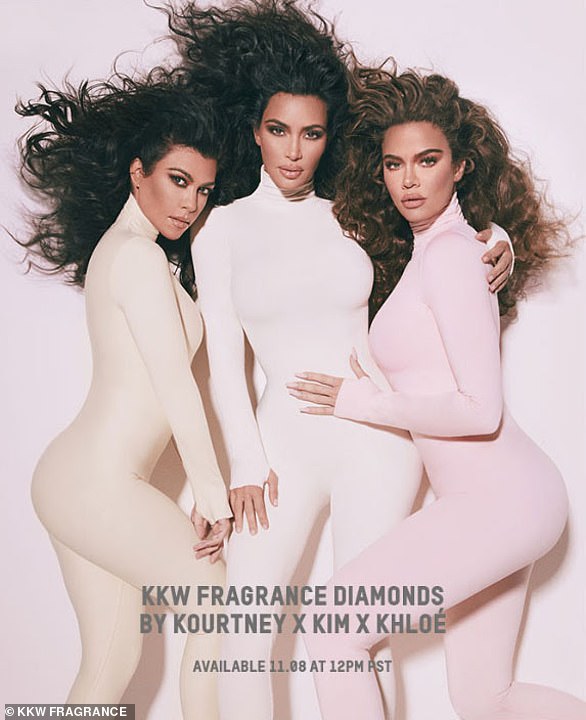 Sister act: Kylie's older sister Kourtney, Kim and Khloe promote their KKW Diamonds fragrance together