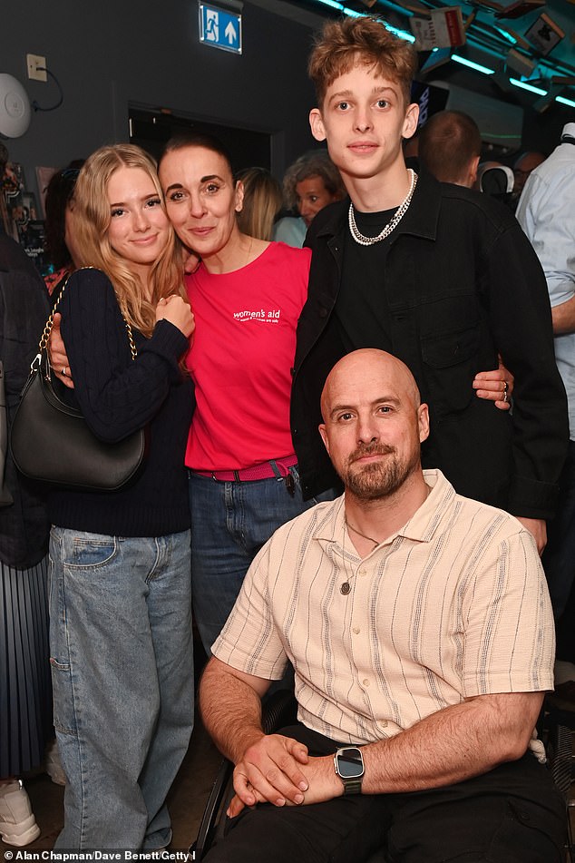 Amanda and actor Martin, 52, were together for 16 years from 2000 to 2016 and share two children, Joe and Grace (seen with Amanda's fiancé Jonathan Goodwin).