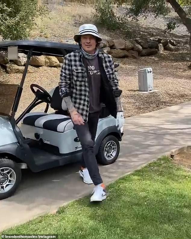 Club sources told TMZ that Brandon was rude to staff members, which contributed to his membership being revoked. But DailyMail.com's source denied that Brandon was rude and said he was a big fan of the staff; his father Tommy Lee is pictured golfing with him.