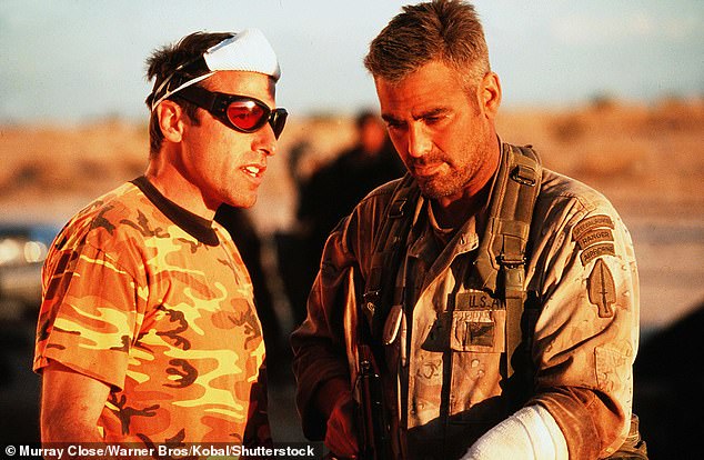 Russell and Clooney were photographed on the set of their 1999 film Three Kings, during which things got physical between them.