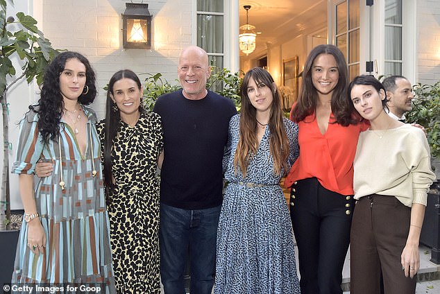 Bruce is pictured in Los Angeles in 2019 with Demi, their three daughters and his current wife Emma Heming (second from right), with whom he has two younger daughters.