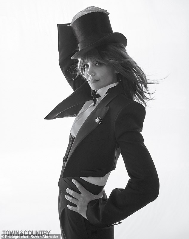 The Batman Begins actress was spotted sporting a top hat and a Dolce & Gabbana ensemble in a series of photos.