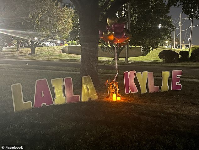 Laila and Kylie's neighbors set up a memorial where the girls used to play.