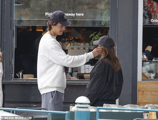 At one point, Ben brushed Eve's hair out of her face in a touching gesture as they waited for their coffee orders.