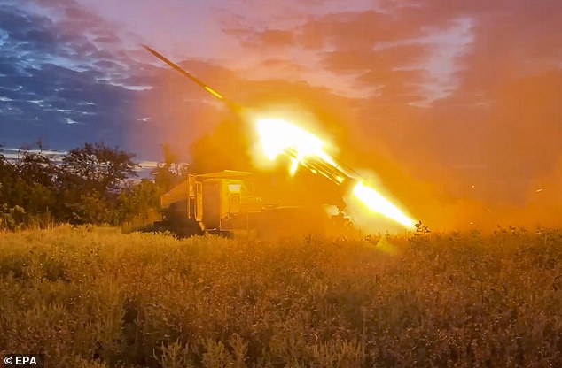 A still image taken from a video provided by the Russian Defense Ministry shows the BM-21 'Grad', a 122mm self-propelled multiple rocket launcher, firing near the combat line near Soledar, Donetsk region, Ukraine, August 13, 2024.