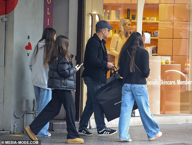 The family were seen carrying bags as they left the popular Bondi shopping spot and headed to their vehicle.