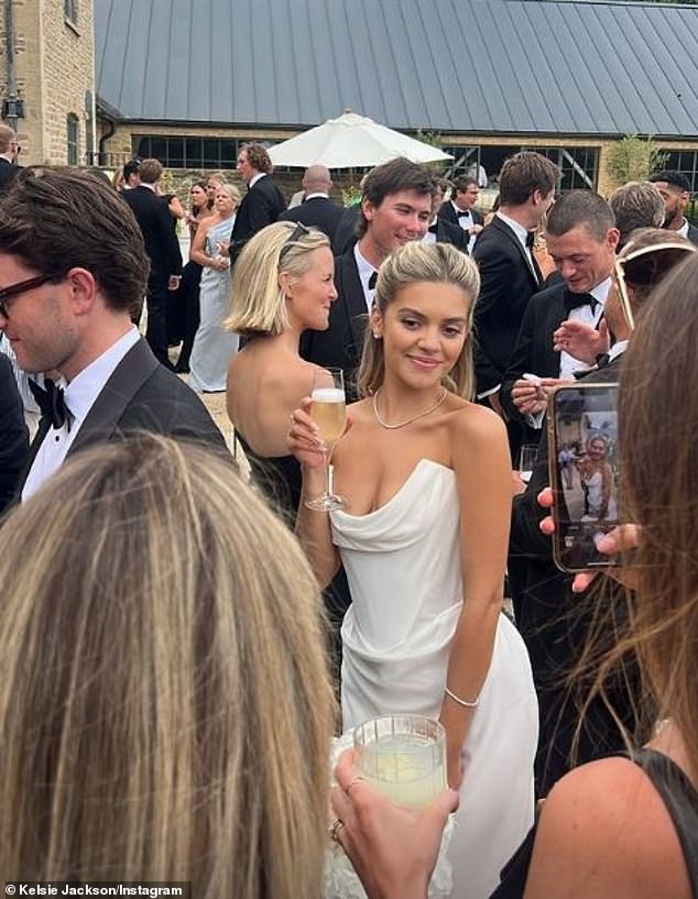 India looked every inch the bride in a gorgeous strapless white satin gown, and let her minimalist outfit do the talking by keeping accessories simple.