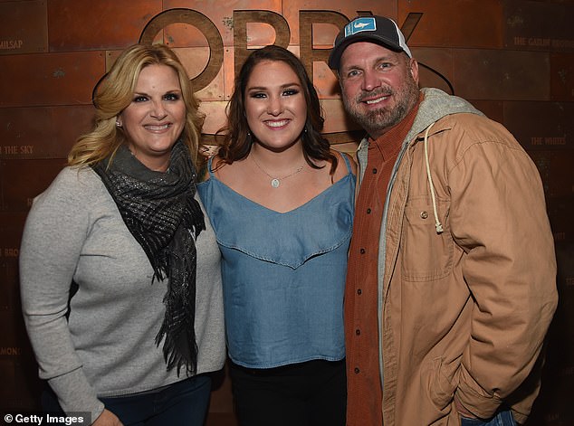 Another source said Garth, who has three daughters with ex-wife Sandy Mahl, is fully dedicated to ensuring his daughters don't grow up in a world of luxury. He was seen with Trisha and Allie in 2017.