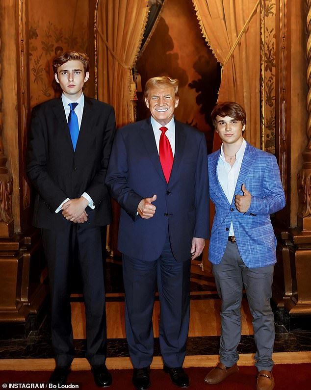 Barron Trump, Donald Trump and Bo Loudon pose for a photo at Trump's home and club, Mar-a-Lago