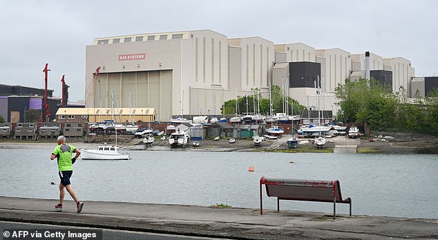 Experts believe the unnamed target in Cumbria could be the Royal Navy's submarine shipyard at Barrow-in-Furness. Pictured: BAE Systems, where many of the ships are built