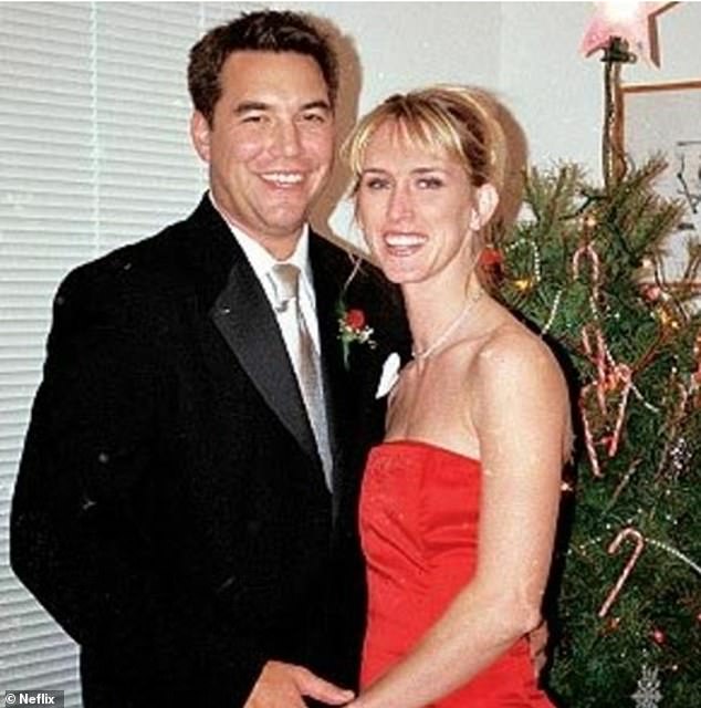 Scott Peterson and Amber Frey, photographed together at a Christmas party on December 14, 2002