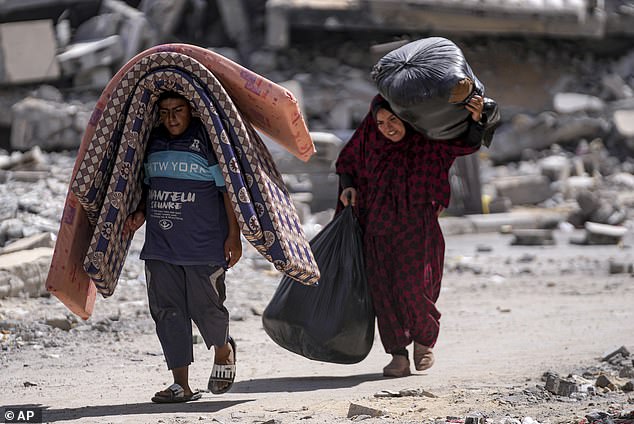 Dutton said the government should freeze immigration to Gaza amid claims that people fleeing the war could be linked to Hamas (pictured: displaced Palestinians in the Gaza Strip)