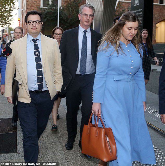 Brittany Higgins (right) and David Sharaz (left) were pictured leaving the David Malcolm Justice Centre in Perth on Wednesday night after a nine-hour mediation. Just hours later, she reportedly attended hospital.