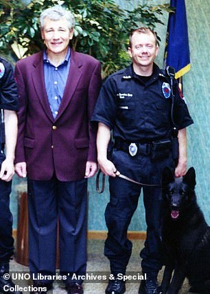 Police officer Steve Rasgorshek in 2001 with then-Senator Chuck Hagel