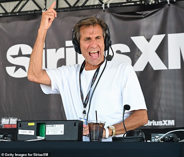 Chris Russo is seen doing a remote broadcast on Jersey Shore in July.