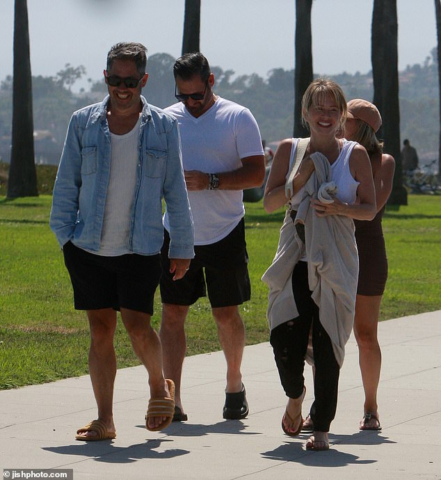 Among their famous neighbors now are the Duke and Duchess of Sussex, Oprah Winfrey, Ellen Degeneres and many more. (Pictured: Dina, David and friends enjoying a sunny day in Montecito)