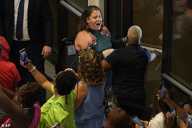 A protester is ejected from the Biden-Harris event in Maryland. Pro-Palestinian protesters also silenced the president during his speech to an overflowing hall