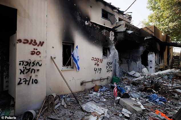 Damage to a building in Kibbutz Be'eri in Israel following Hamas attacks on October 7