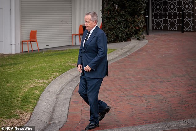 Former Labor leader Bill Shorten was one of many who paid farewell to Carter at a funeral at Flemington Racecourse on Friday.