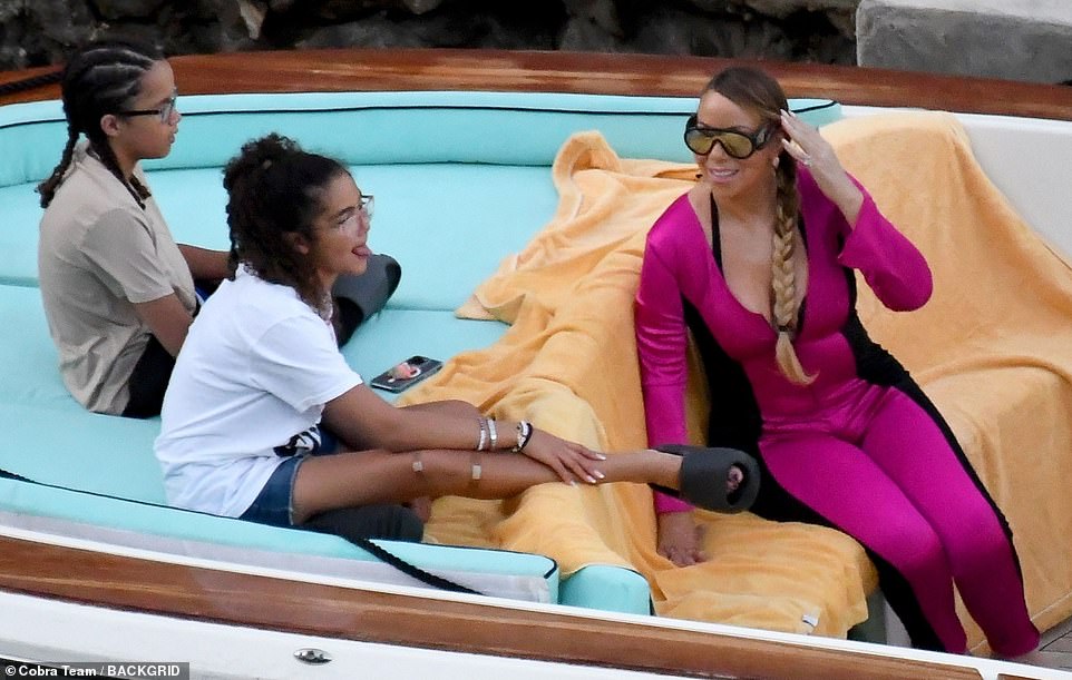 The We Belong Together singer enjoyed a relaxing day out on a boat with the 13-year-olds on the picturesque Amalfi Coast.