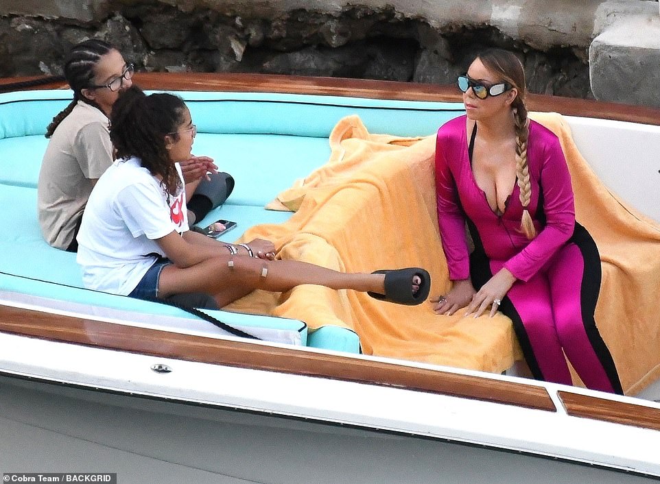 Mariah was seen being helped onto the boat as other close friends accompanied her during the joyous outing.